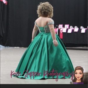 Tiffany size 10. Corset back. It has been hemmed however it can be let out.